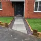 Stone paved pathway on house in Gloucester