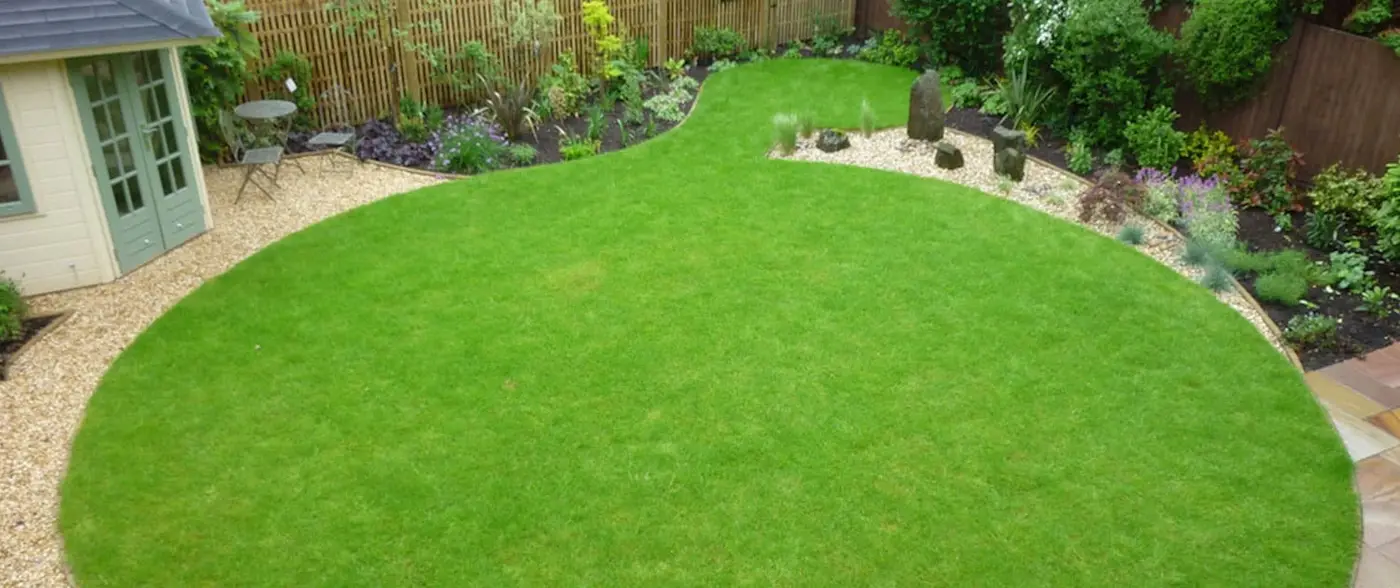Lawns and artificial grass beautiful garden design with stone flower beds