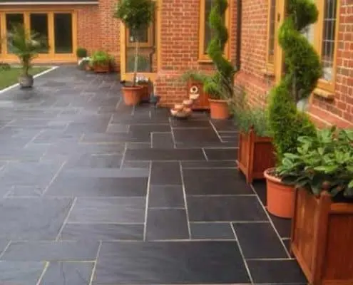 RearPationGardenRoomGloucestershire Beautiful slate patio by Gloucestershire R Lugg