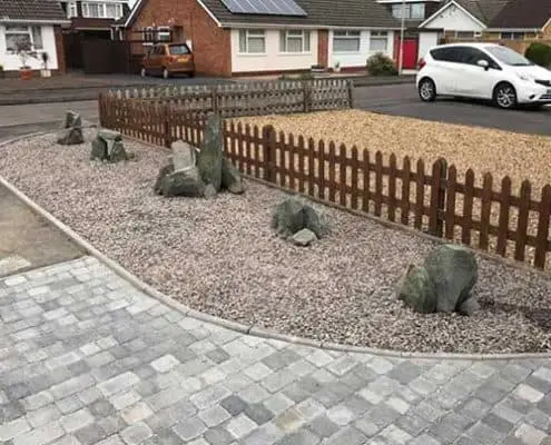 PavedDriveWayBishopsCleeve Bishops Cleave driveway and stone flowerbeds with rock formations